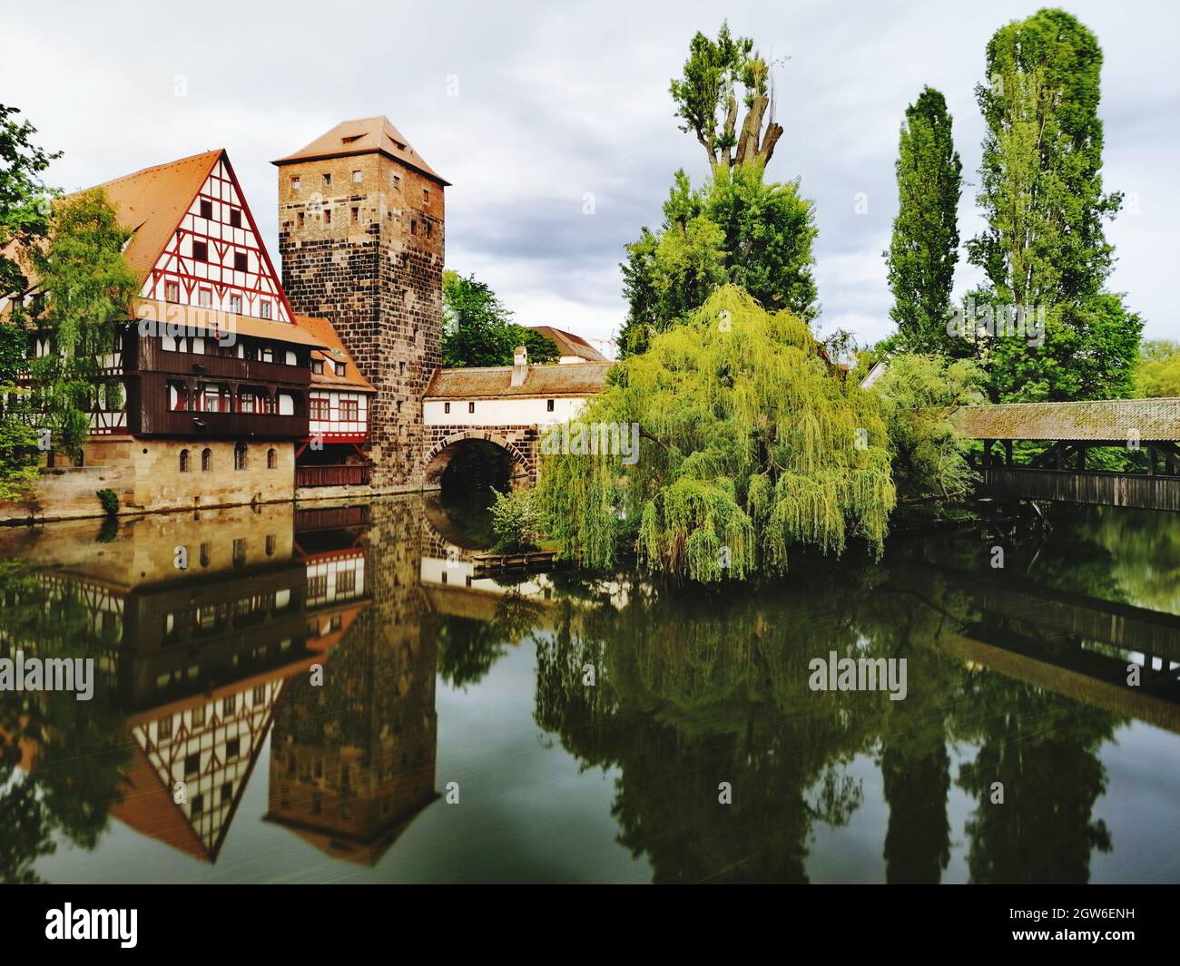 Reflection Of Trees In Lake Against Sky In City Of Touristic Spot In Nuremberg Stock Photo