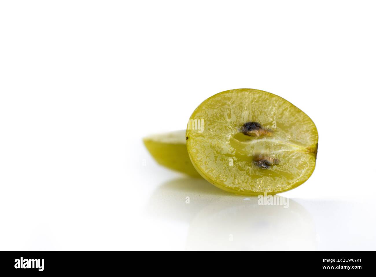 Grape Cut In Half On A White Background Stock Photo Alamy