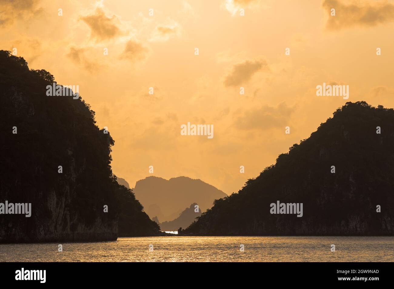 Beautiful seascape photo of sunset at Halong bay at Vietnam. Stock Photo