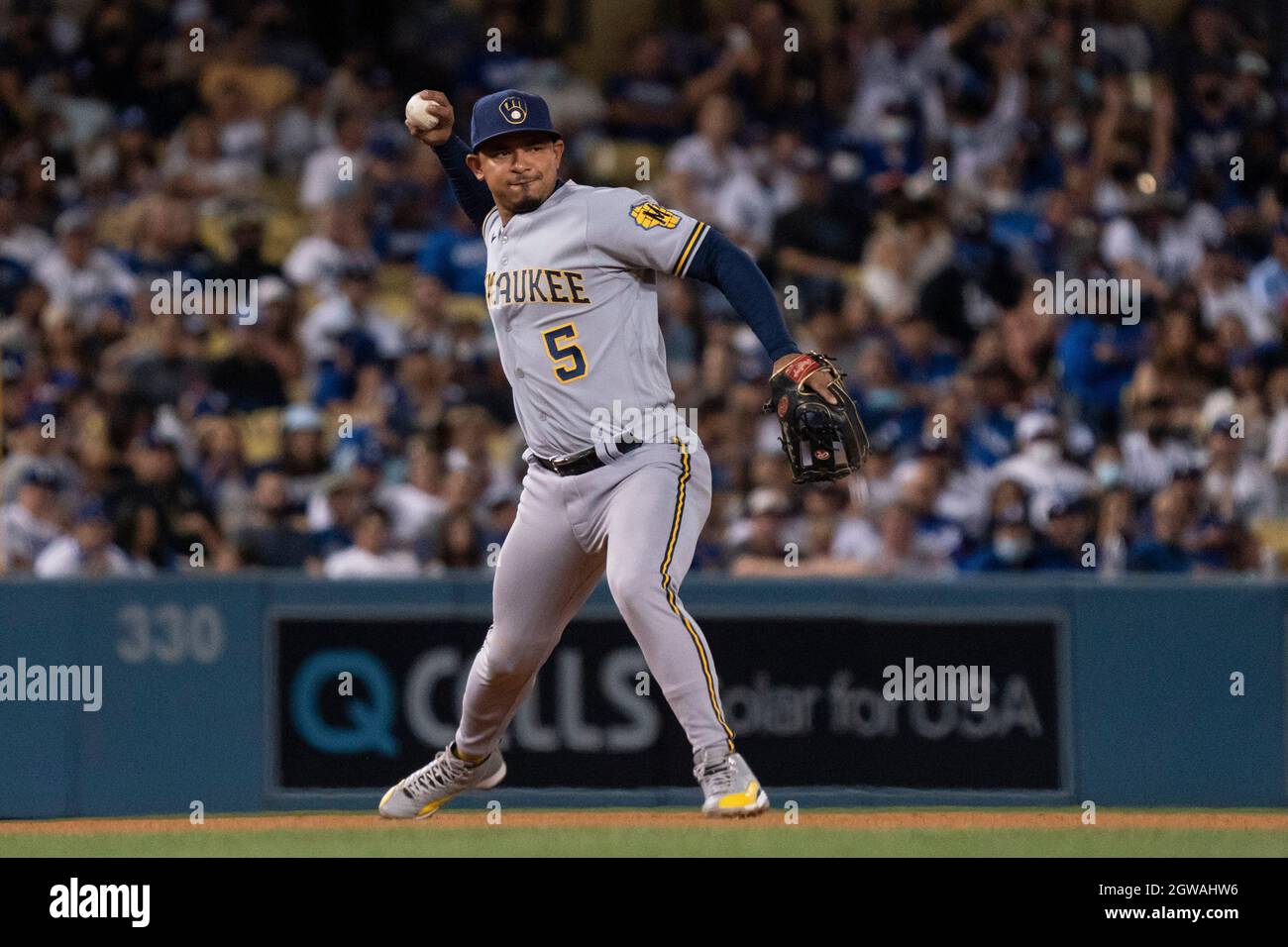 Milwaukee Brewers third baseman Eduardo Escobar (5) throws to first base for an out during a MLB