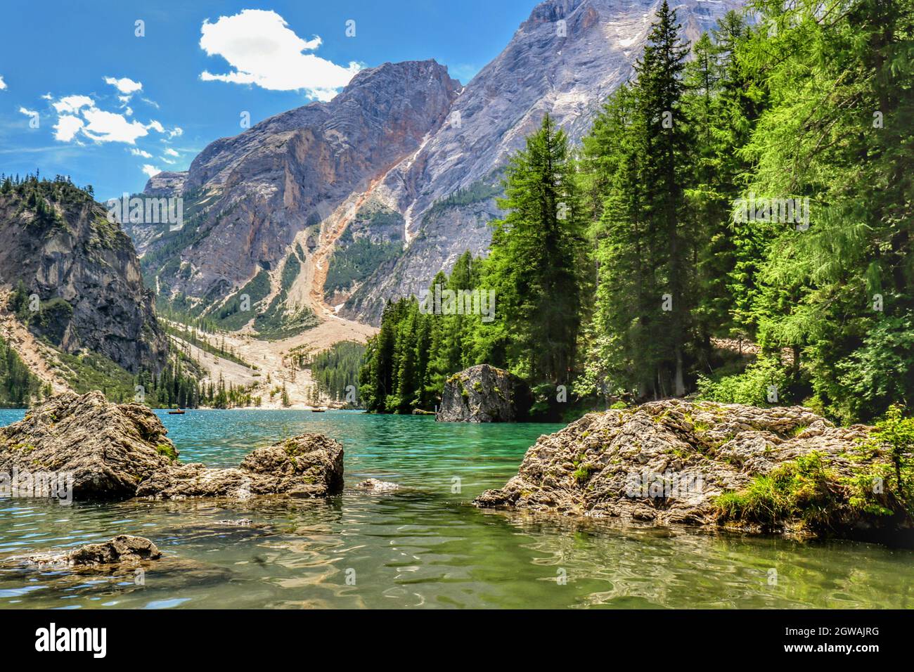 Scenic View Of Lake By Mountains Against Sky Stock Photo