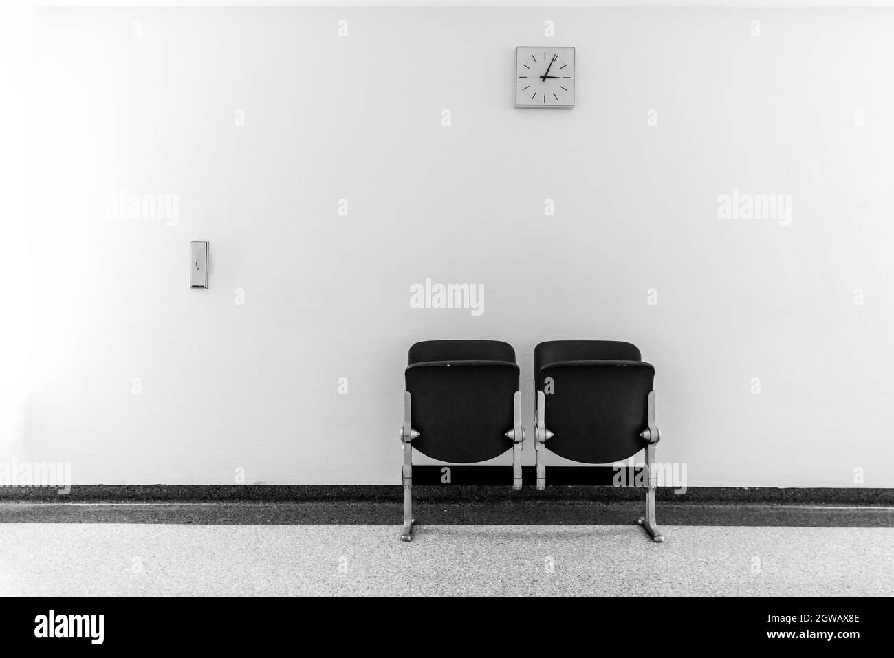 Empty Chair Against Wall At Home Stock Photo Alamy