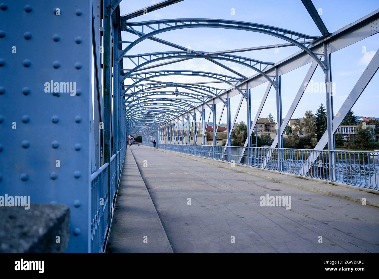 Blue bridge, riveted steel construction, culture memory nowadays for pedestrian and cyclists only. Built in 1892, reconstructed in 1996. Tyn nad Vltav Stock Photo