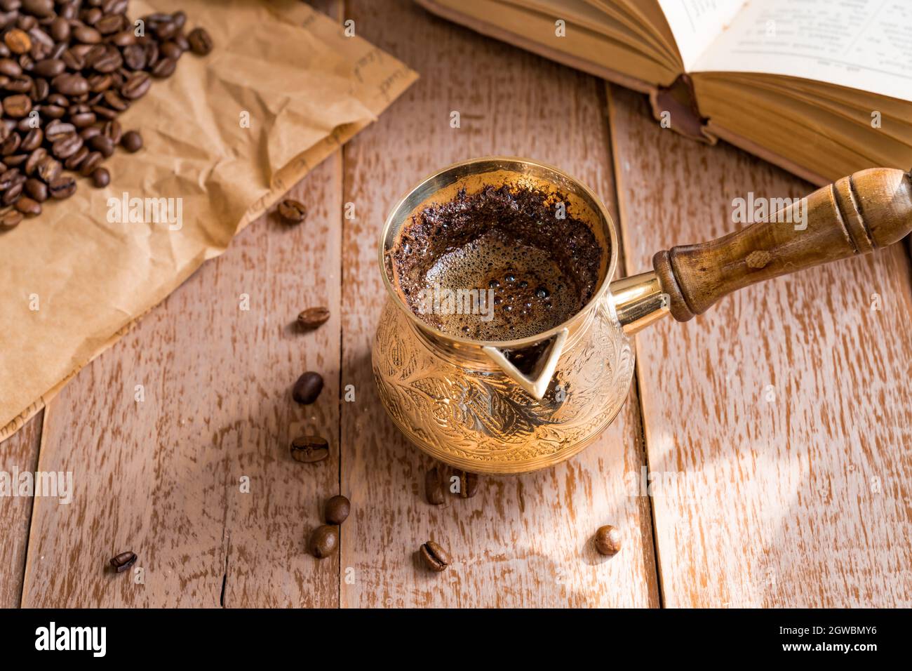 Fresh Breved Coffe In Cezve Traditional Turkish Coffee Pot Opened Book