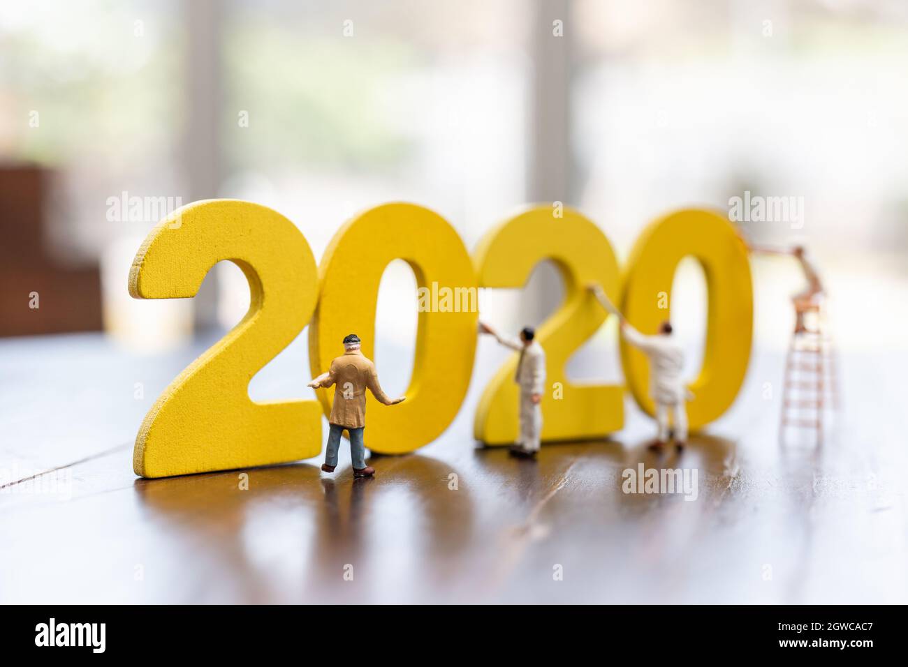 Miniature Worker Team Painted Number 2020 , Happy New Year 2019 Concept Stock Photo