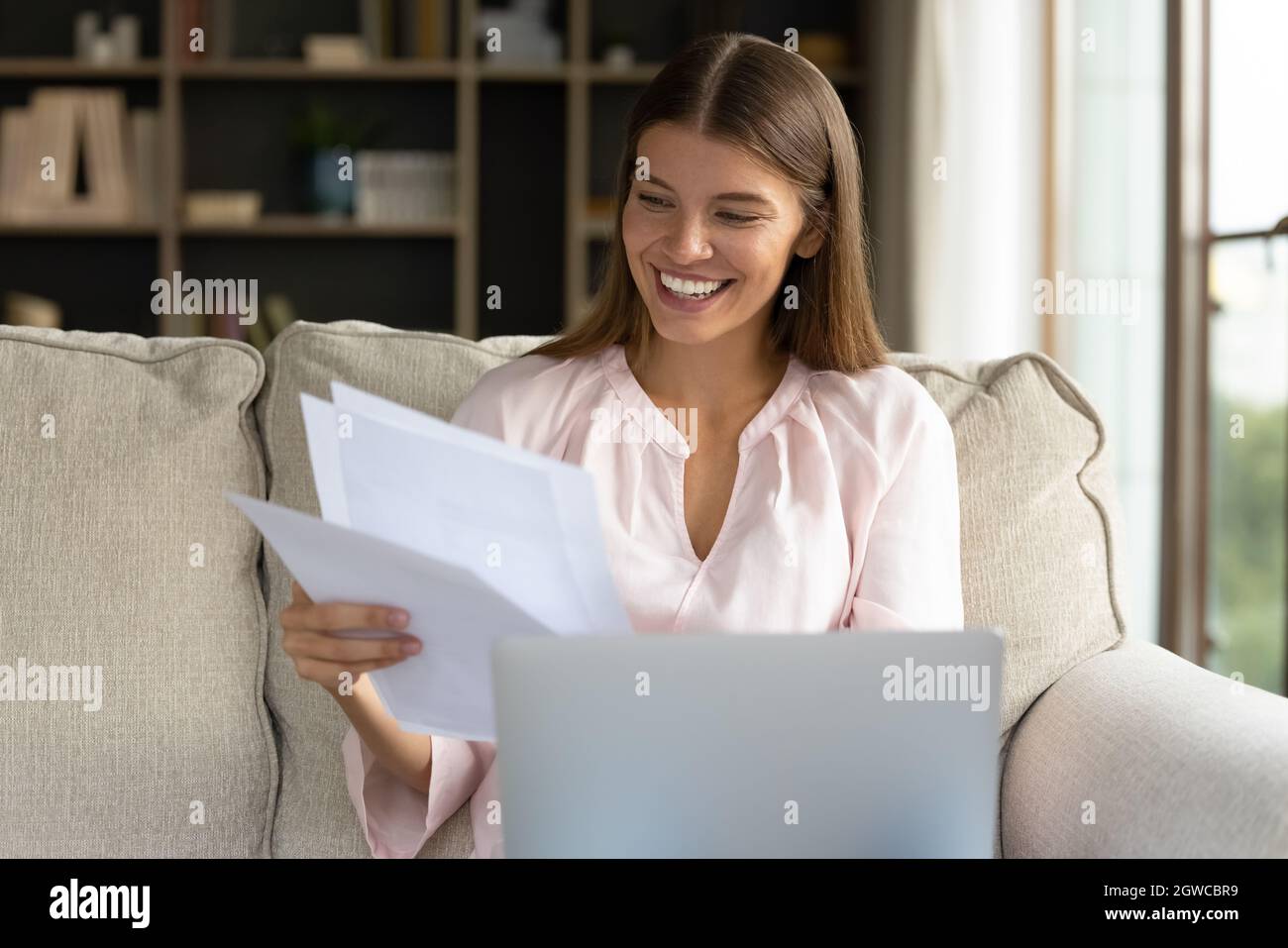 Happy young student girl receiving admission letter from business ...