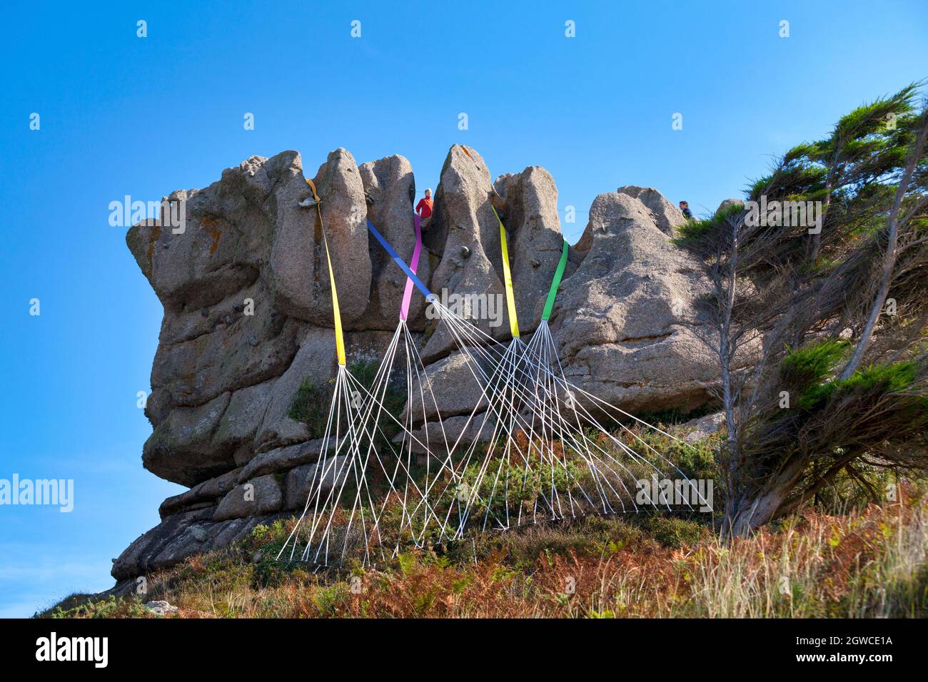 Trégastel, France - September 21 2021: The Crown of King Gradlon is a granite chaos along the coast that is very popular amongst tourists. Stock Photo