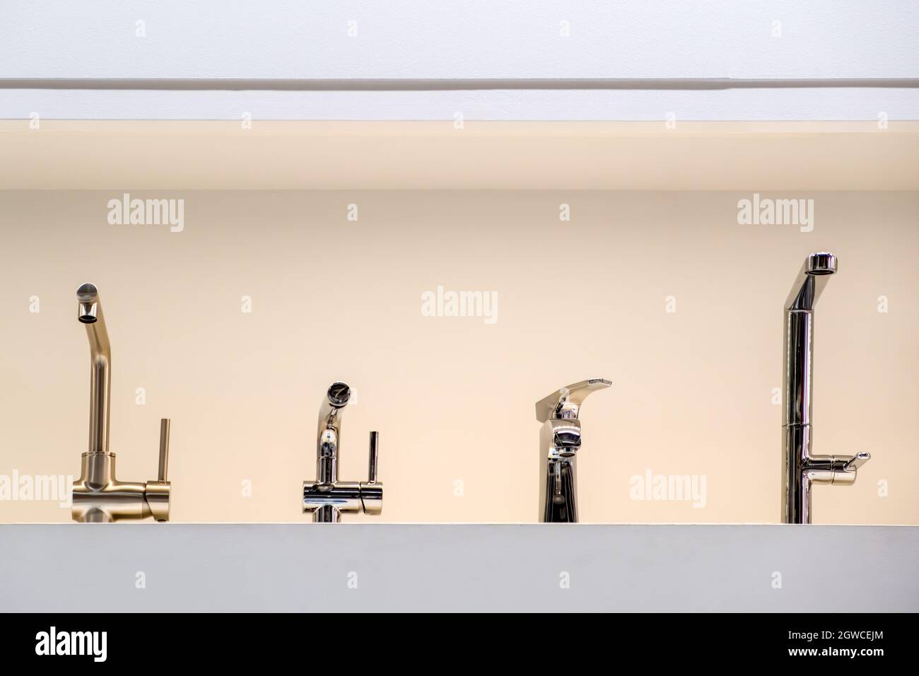 Four Different Faucets In A Row With Copy Space Stock Photo