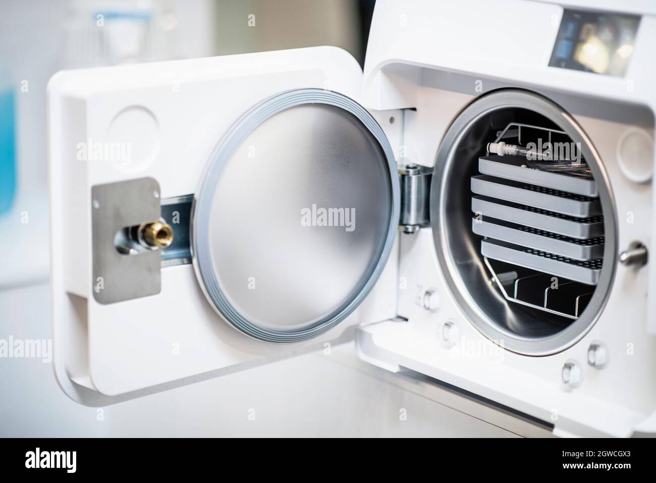 Autoclave In Dentist Office. Dental Infection Control And Sterilization Stock Photo