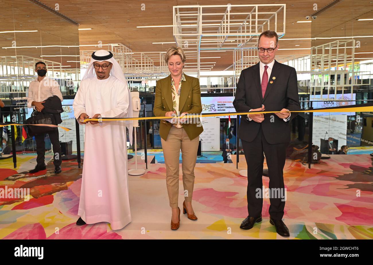 03 October 2021, United Arab Emirates, Dubai: Dawood Abdul Rahman Abdullah Al Hajri (l-r), Director General of Dubai Municipality, Nicole Hoffmeister-Kraut (CDU), Minister of Economic Affairs of Baden-Württemberg, and Ernst Peter Fischer, German Ambassador to the United Arab Emirates, open the Baden-Württemberg pavilion at the Expo in Dubai. For six months, the southwest of Germany will be presenting itself there with 40 innovation projects as well as cultural and culinary performances. Baden-Württemberg is the only federal state represented at the show with its own pavilion. Stock Photo