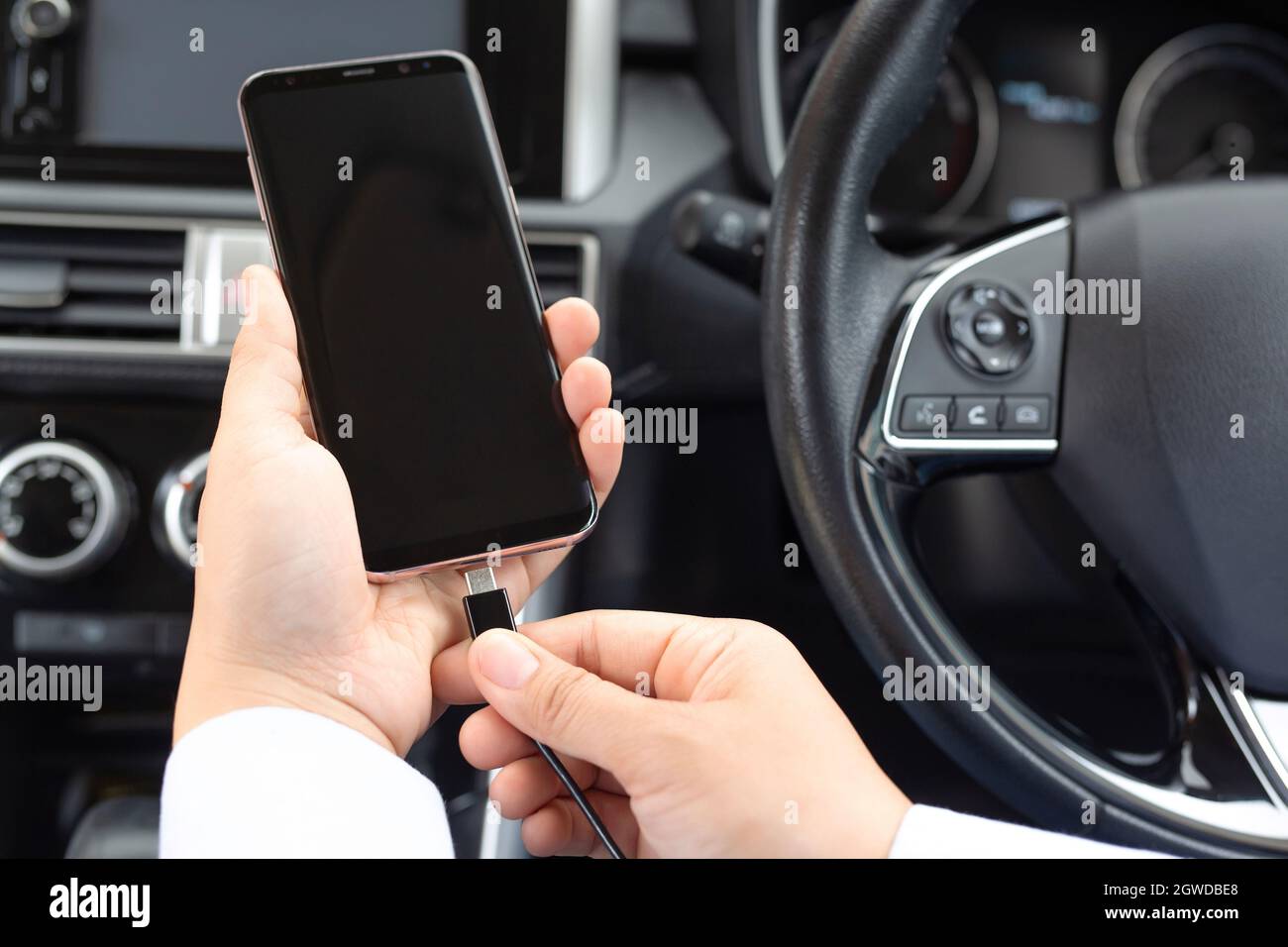 Plug To Charge Mobile Phone In The Car Stock Photo Alamy