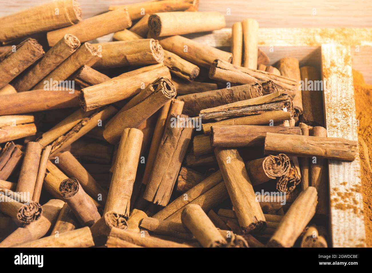 ceylon cinnamon from sri lanka sticks decorative background texture Stock Photo
