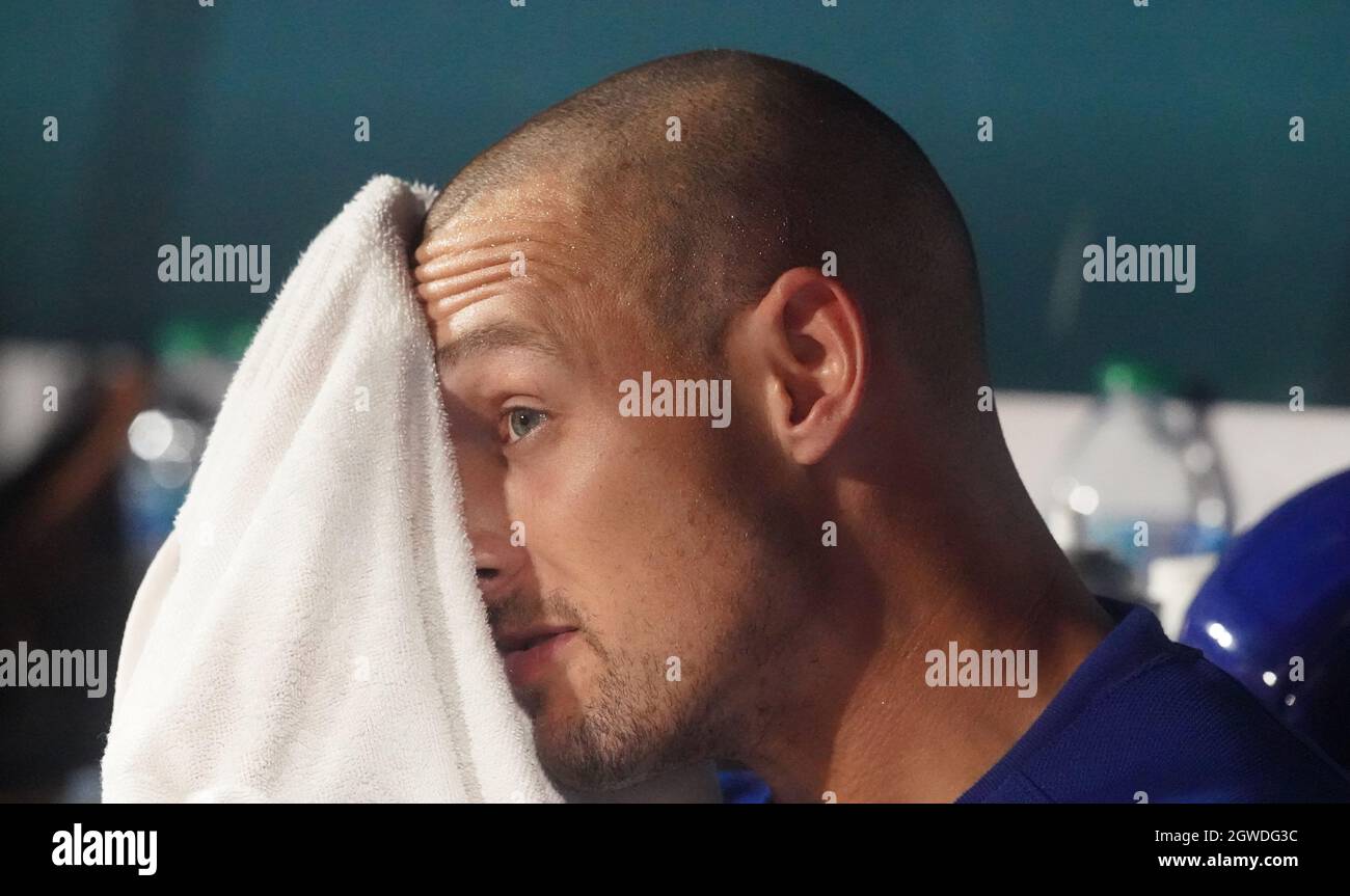 Chicago Cubs Trayce Thompson wipes his face in the dugout after hitting a grand slam home run in the fifth inning against the St. Louis Cardinals at Busch Stadium in St. Louis on Saturday, October 2, 2021. Photo by Bill Greenblatt/UPI Stock Photo