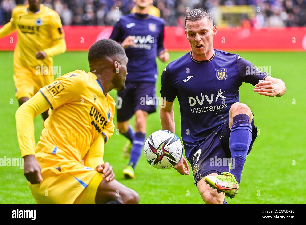 Club's Kamal Sowah and Anderlecht's Sergio Gomez fight for the