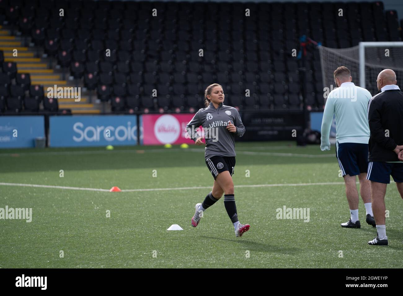 Back in the match day squad after her injury Althea Paul (10 Sheffield United) warms up ahead of the FA Womens Championship match between Crystal Palace and Sheffield United at Hayes Lane, Bromley, England. Stock Photo