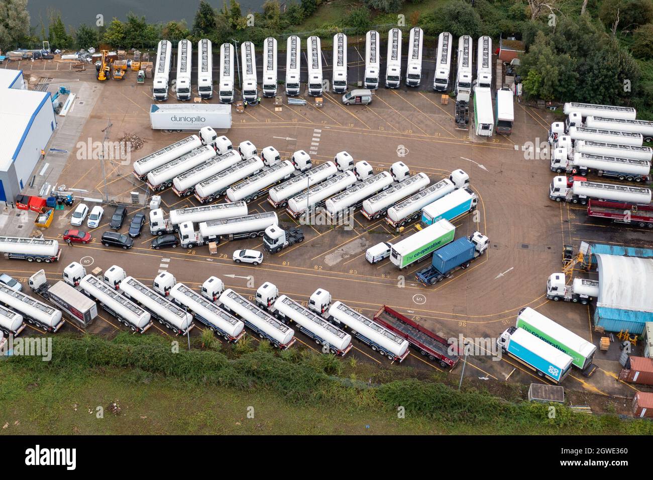 Picture dated October 1st shows the  governmentÕs reserve petrol tankers sitting in storage in Fenstanton,Cambridgeshire,on Friday morning despite the ongoing fuel crisis.Only a handful of the 40 tankers, worth an estimated £4 million, have been seen leaving this week.  The governmentÕs reserve petrol tankers are sitting in a storage yard in Cambridgeshire this morning (Fri) as the fuel crisis continues.  Around 40 tankers, worth an estimated £4 million, are parked in the storage depot in Fenstanton, whilst forecourts across the UK remain closed due to a shortage of truck drivers. Stock Photo
