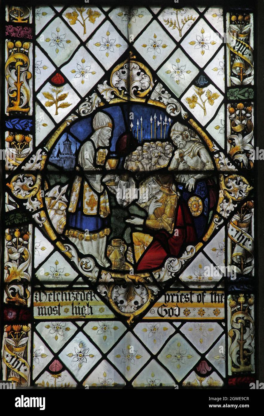 Detail of a stained glass window by Frederick Charles Eden (1864-1944) depicting Melchizedek, Church of St Peter and St Paul, Steeple Aston, Oxfordshi Stock Photo