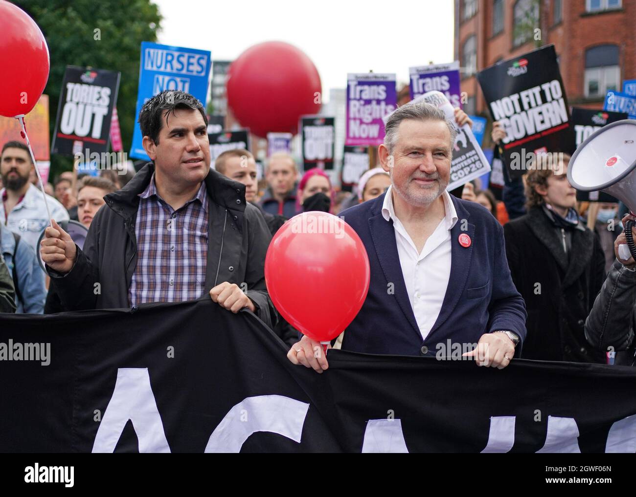 Labour MPs Richard Burgon (left) and Barry Gardiner take part in an anti  government protest in Manchester, during the Conservative party's annual  conference being held at the Manchester Central Convention Complex. Picture