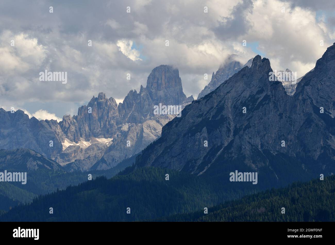 The Dolomite group of Cristallo partially covered by the Daumkofel peak and  the last slopes of Monte delle Rondini Stock Photo - Alamy