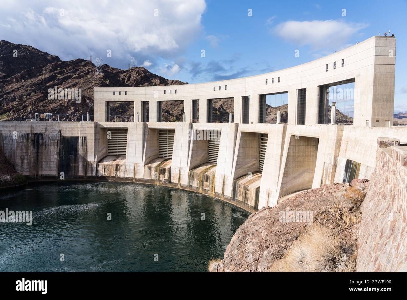 Parker Dam is a concrete archgravity dam built on the Colorado River in 1938 & impounds Lake
