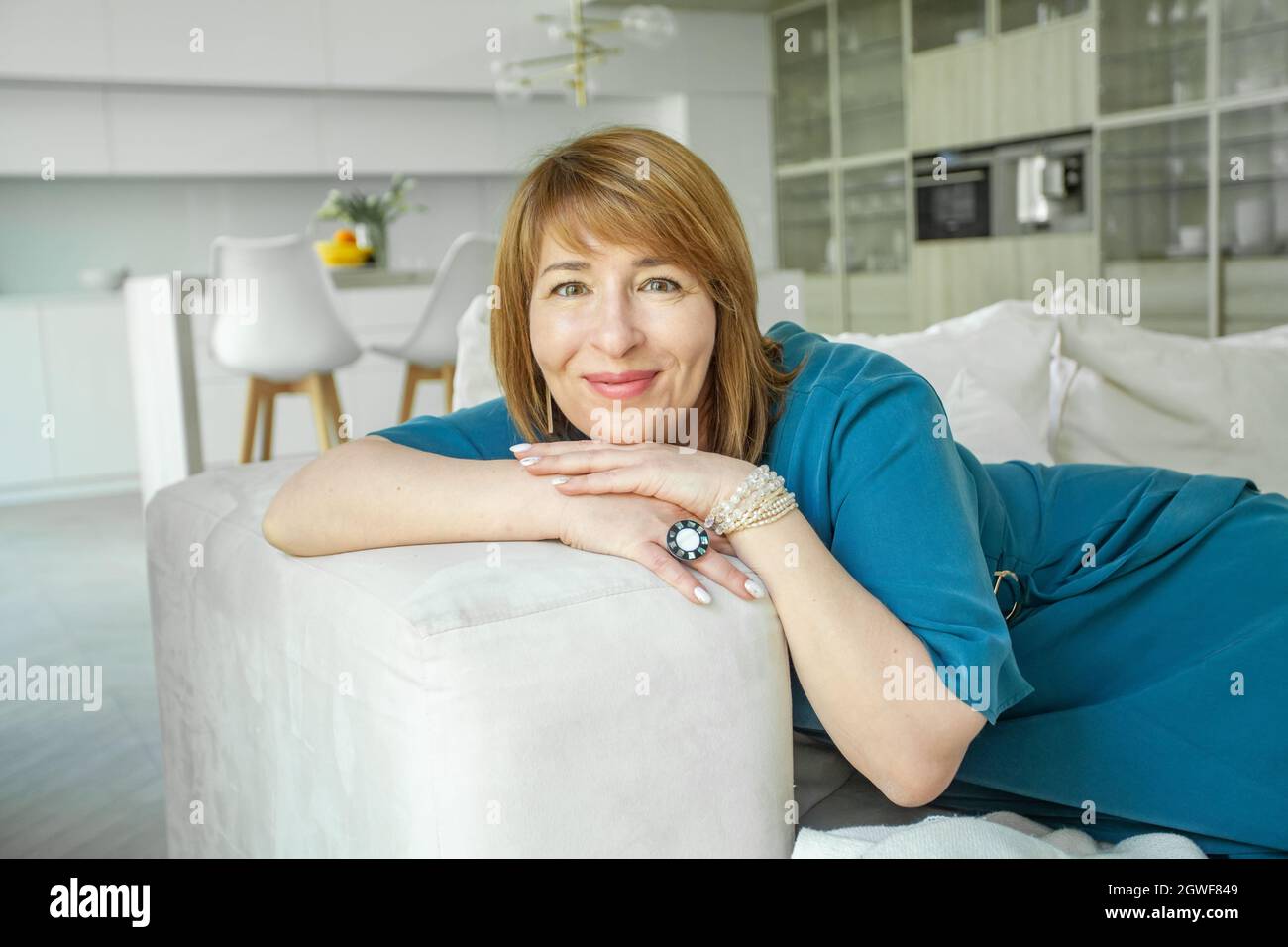 Happy ginger woman posing hi-res stock photography and images - Alamy