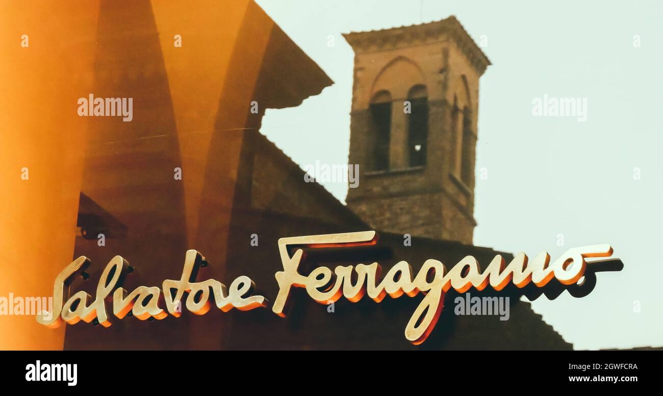 Florence, Italy - August 5, 2021: Salvatore Ferragamo store sign located in the famous fashion district of Via dei Tornabuoni, Florence, Italy. Stock Photo