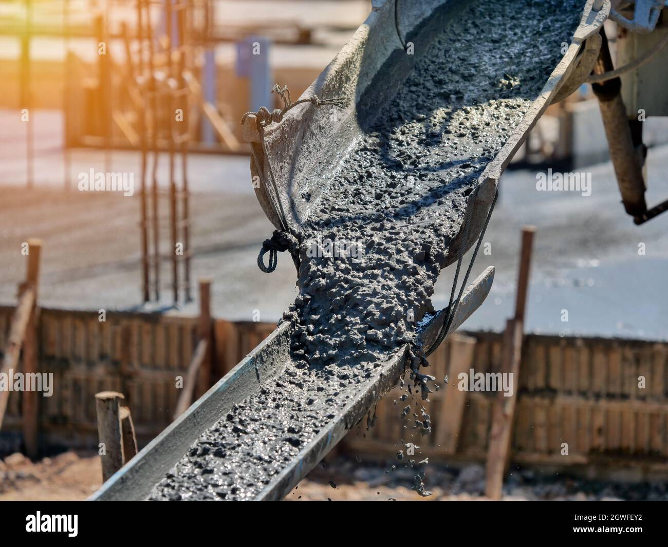 Pouring Concrete Mix In Construction Site Stock Photo Alamy