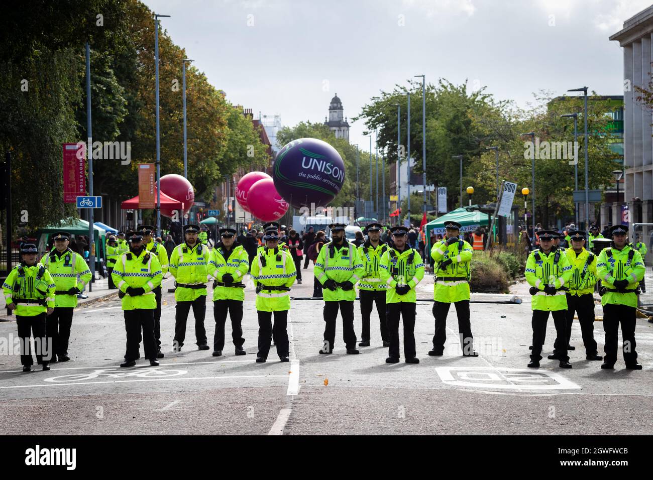 Manchester, UK. 03rd Oct, 2021. Police await the start of the The Peoples Assembly march. Social movements and unions unite and march past the Conservative Party Conference demanding fairer policies for the working class. Credit: Andy Barton/Alamy Live News Stock Photo
