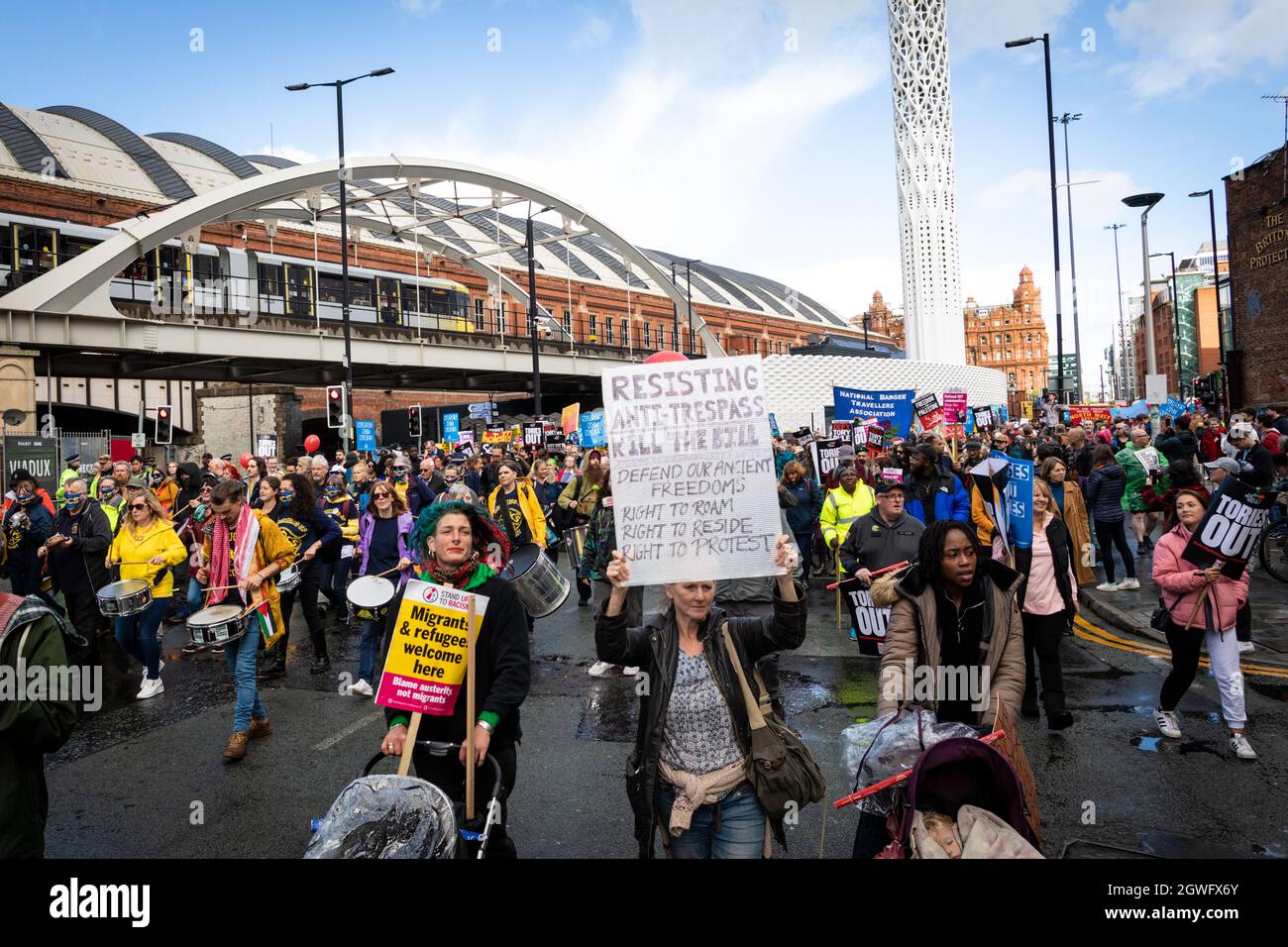 Manchester, UK. 03rd Oct, 2021. Thousands of demonstrators march past Manchester Central where the Conservative party Conference is being held. Social movements and unions unite demanding fairer policies for the working class. Credit: Andy Barton/Alamy Live News Stock Photo