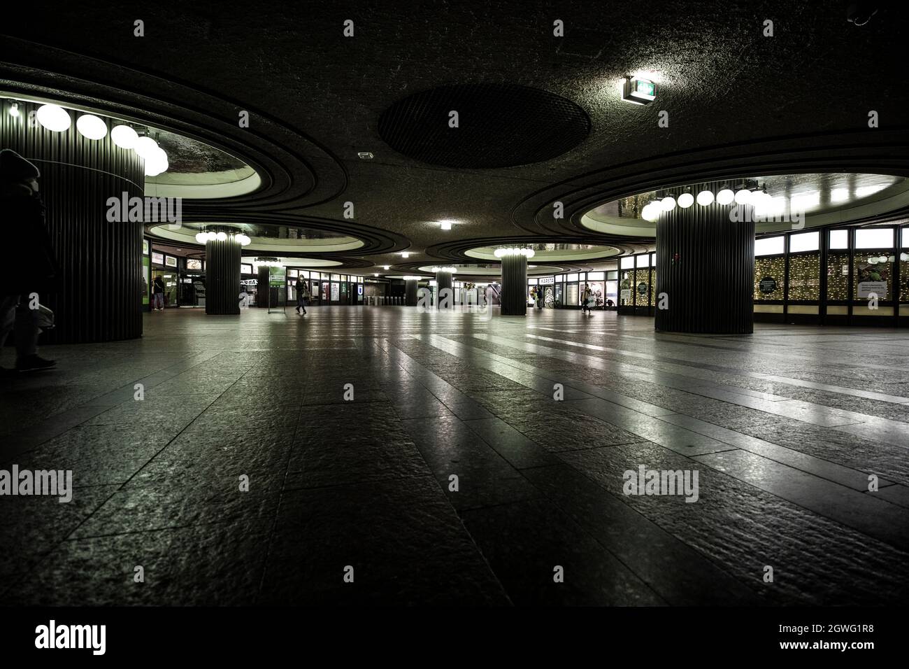 Illuminated Walkway In Building Stock Photo - Alamy