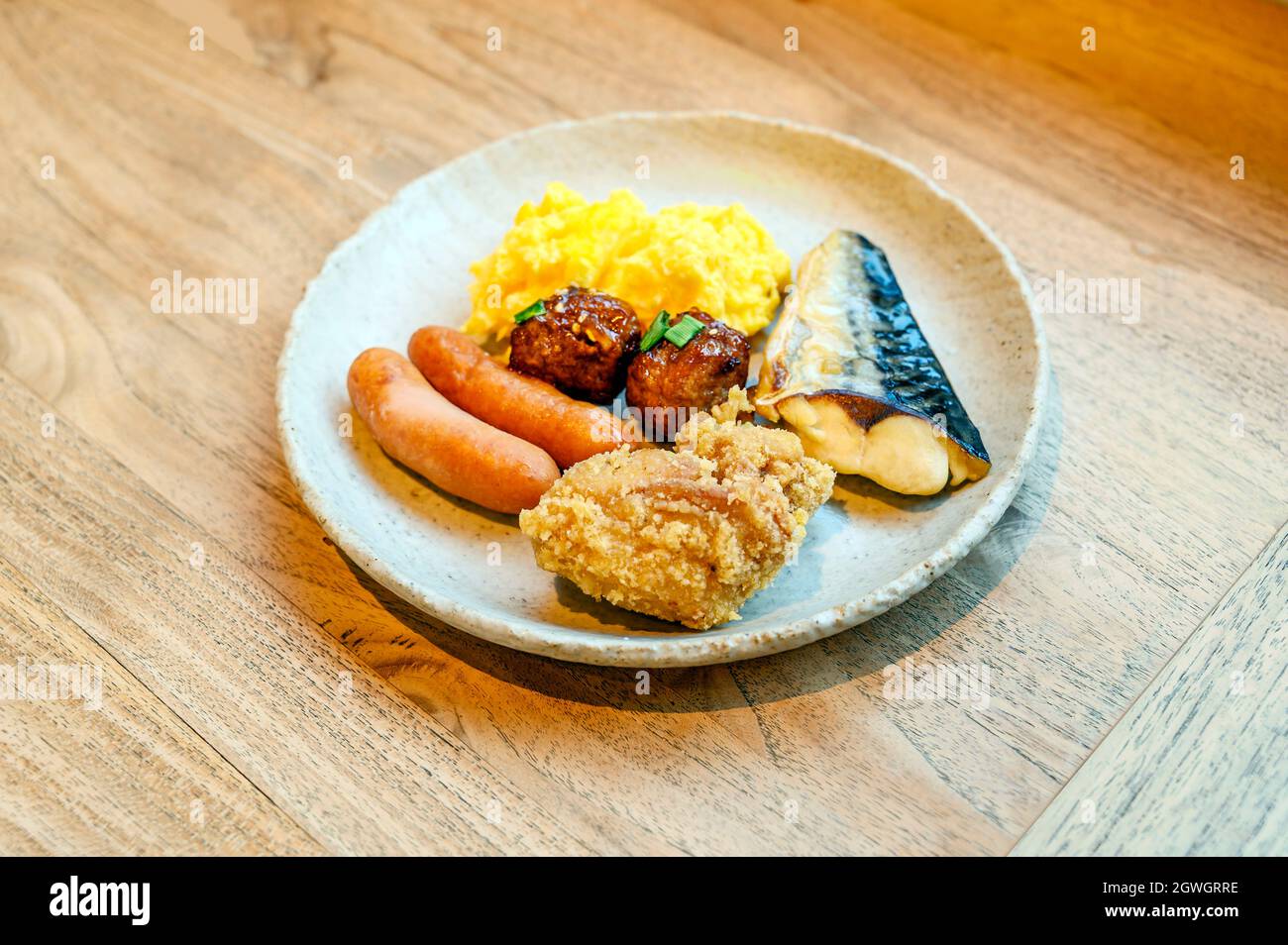 High Angle View Of Food In Plate On Table Stock Photo