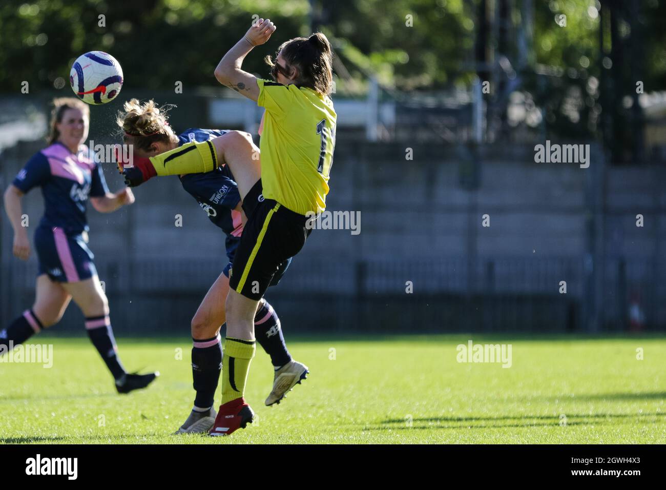 London, UK. 03rd Oct, 2021. Asia Harbour-Brown (18 Dulwich Hamlet) and Erin  MacLennan (11 Herne Bay) in action during the Vitality Womens FA Cup 2nd  round qualifying game between Dulwich Hamlet and