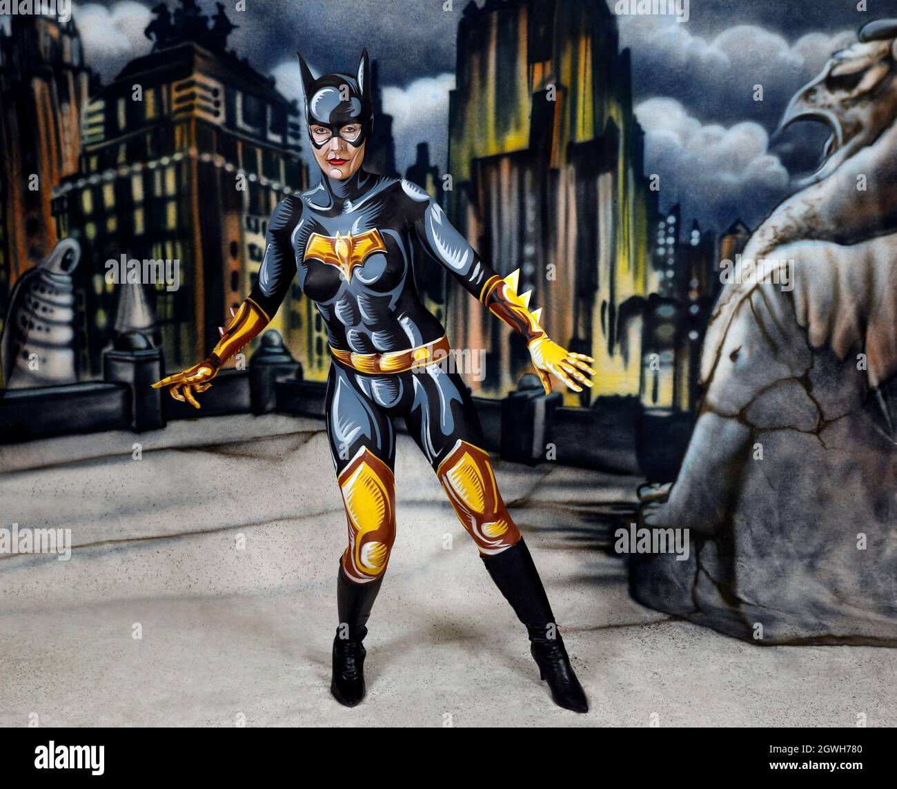 GEEK ART - Bodypainting and Transformaking: Batgirl comic photoshooting with Janina in a sprayed comic setting by Enrico Lein at Studio Düsterwald in Hameln on September 27, 2021  - A project by the photographer Tschiponnique Skupin and the bodypainter Enrico Lein Stock Photo