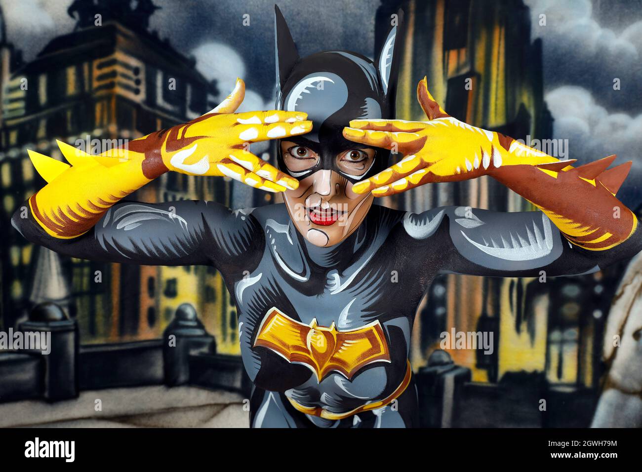 GEEK ART - Bodypainting and Transformaking: Batgirl comic photoshooting with Janina in a sprayed comic setting by Enrico Lein at Studio Düsterwald in Hameln on September 27, 2021  - A project by the photographer Tschiponnique Skupin and the bodypainter Enrico Lein Stock Photo