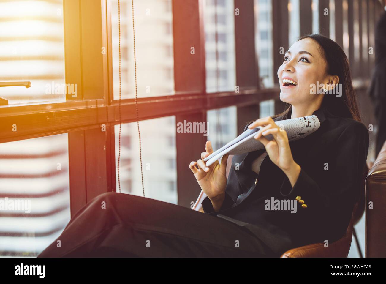 Success executive Asian business women happy with good news in office Stock Photo