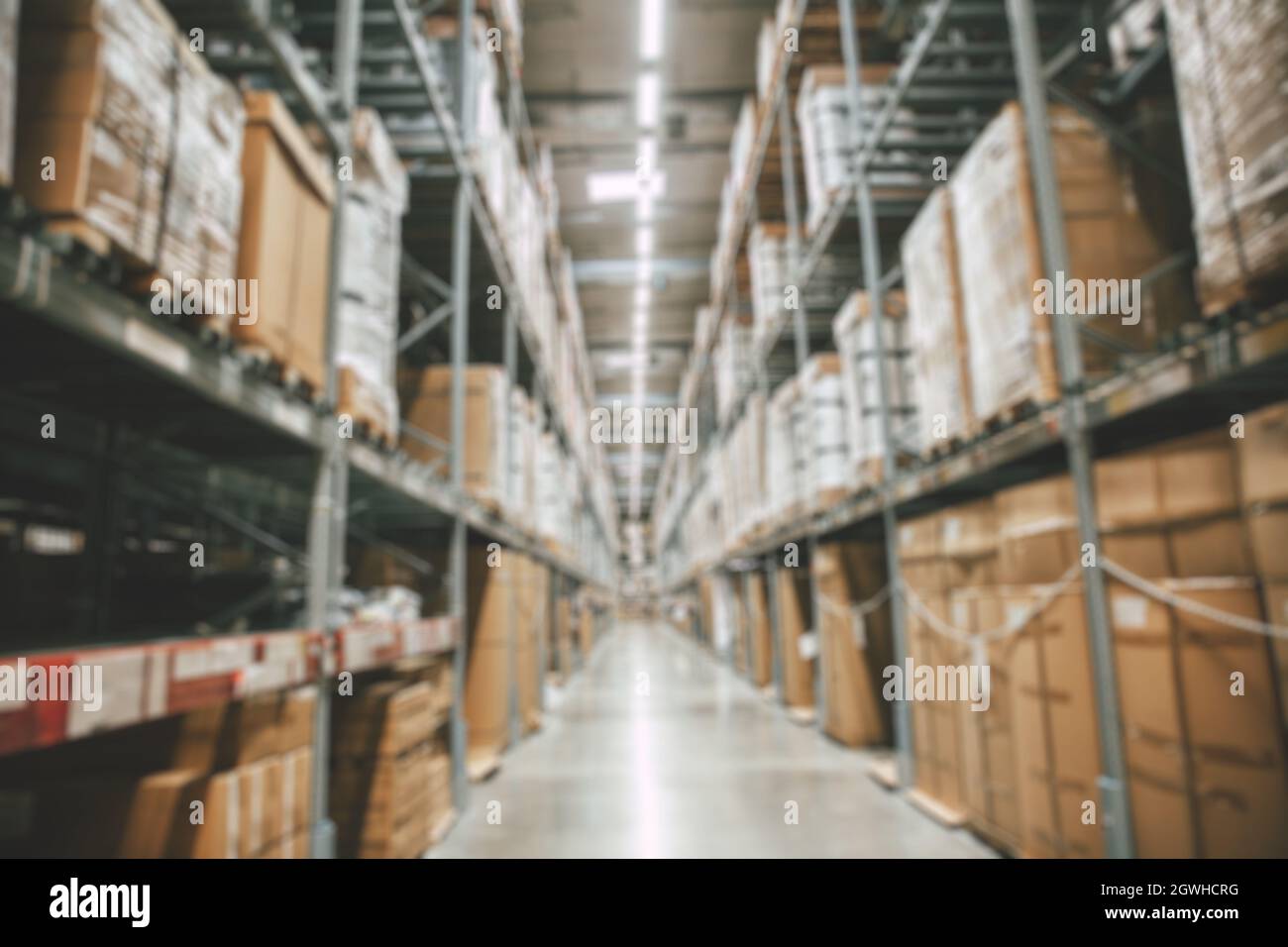 Blur warehouse goods stock products inventory or factory cargo storage prepare for shipping distribution background. Stock Photo