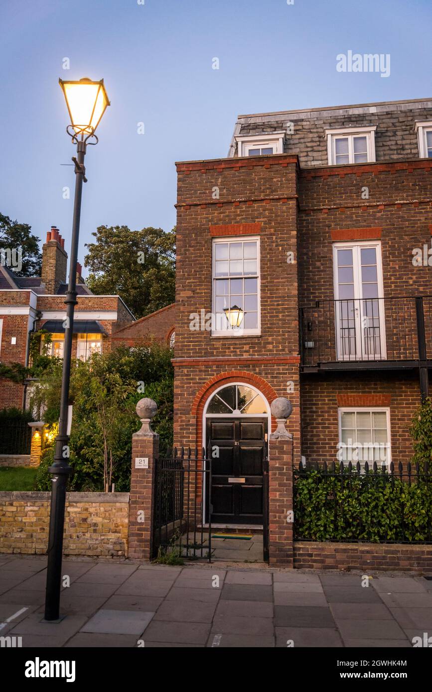 Posh house on the Hammersmith Riverside at dusk, Hammersmith, London