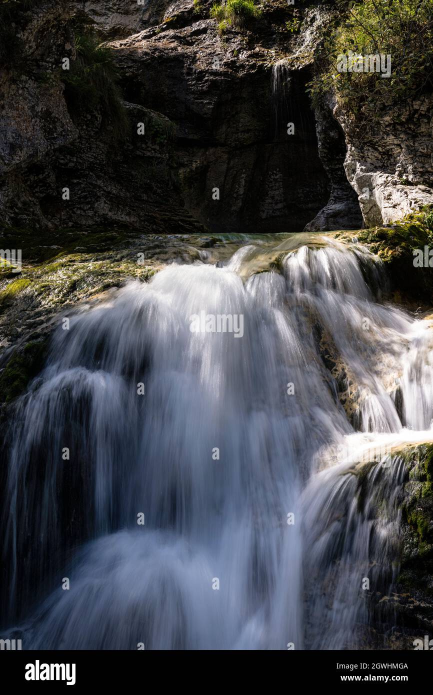 the small waterfalls of a stream that flows through the woods Stock ...