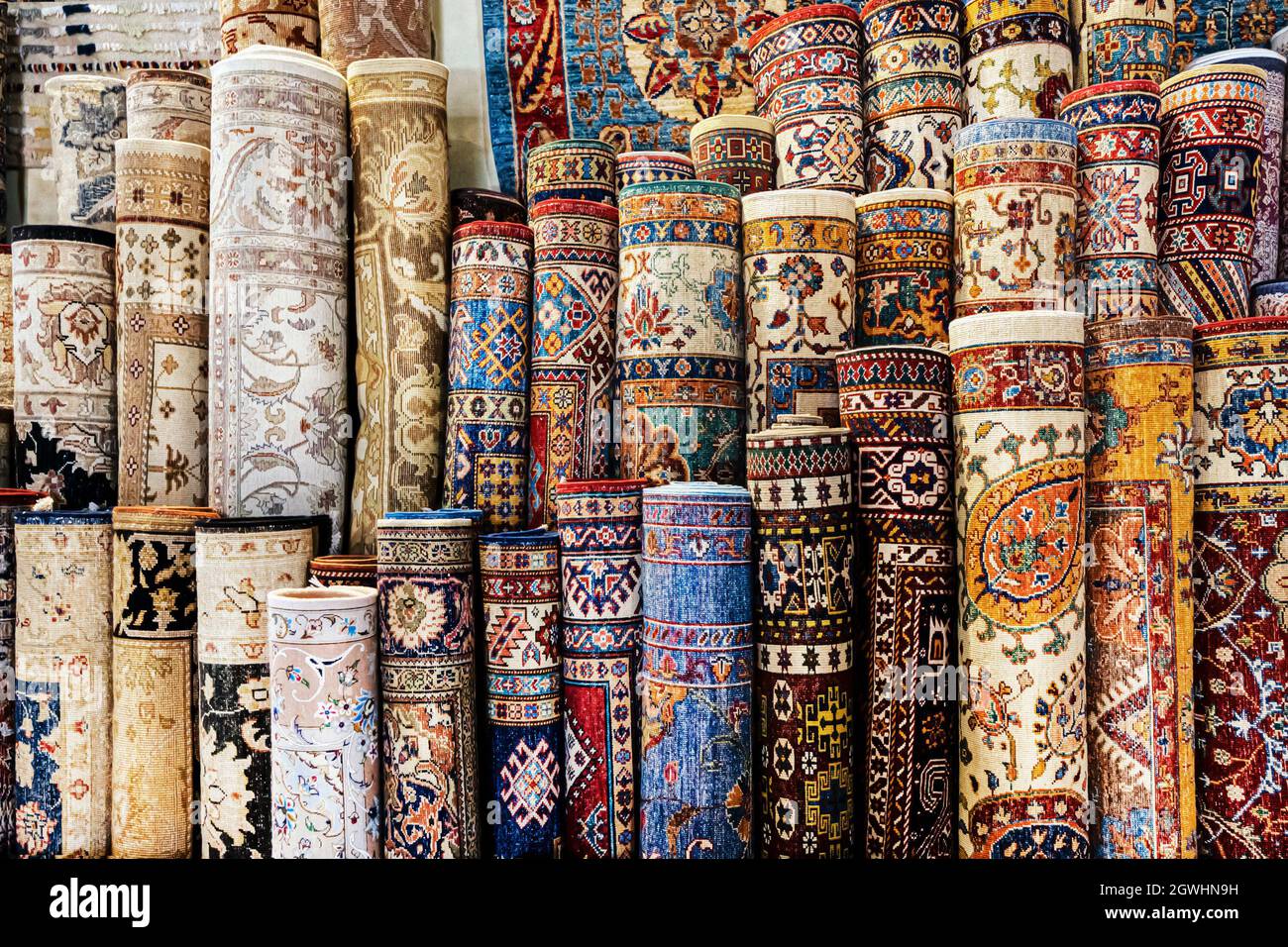 handmade carpets. a lot of rolled carpets in the store are national