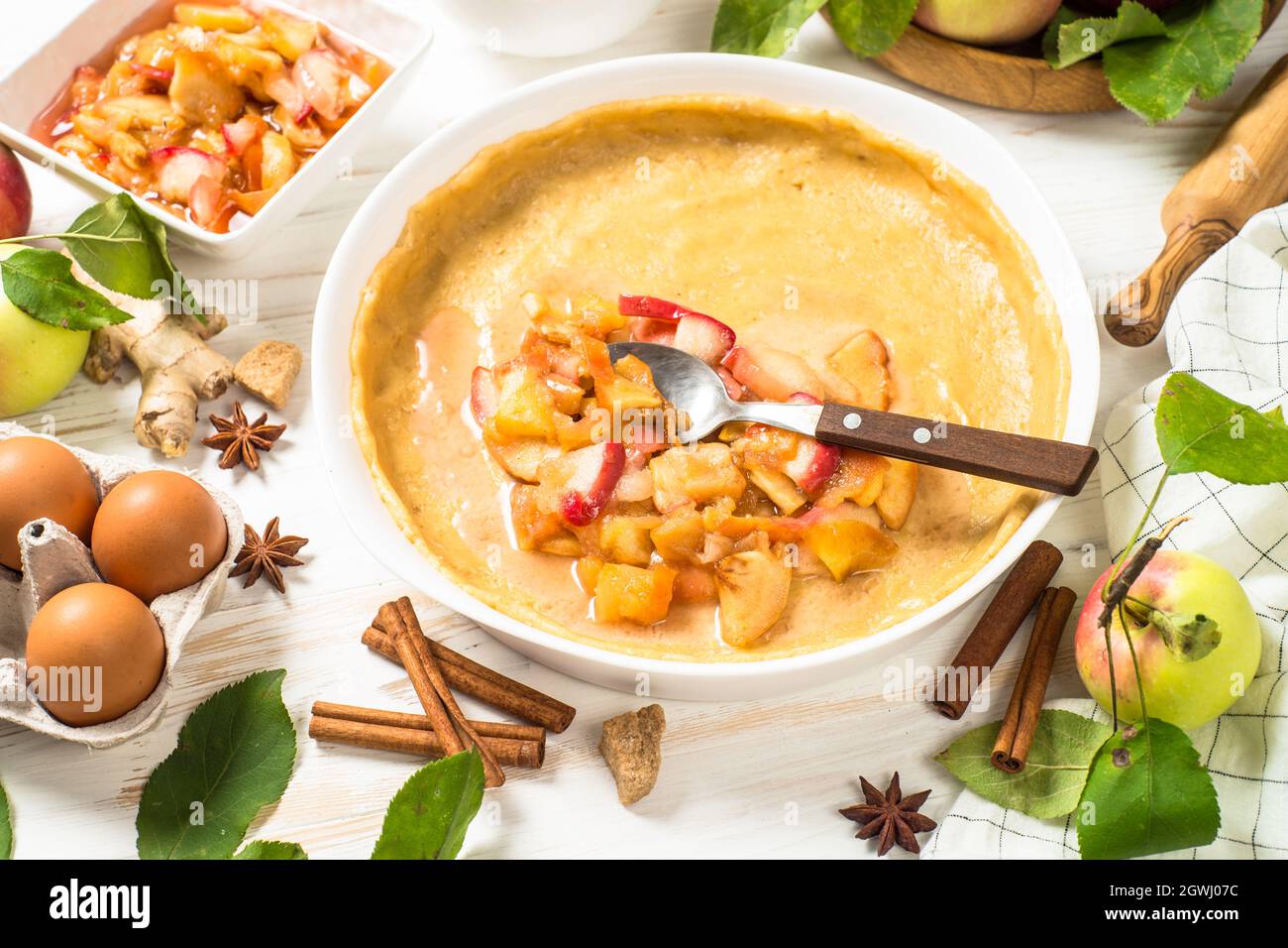 Apple pie with ingredients for cooking top view. Stock Photo