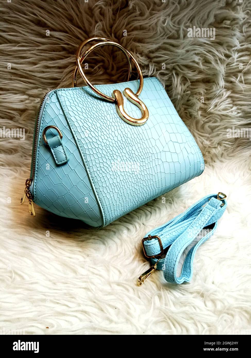 light blue sling bag