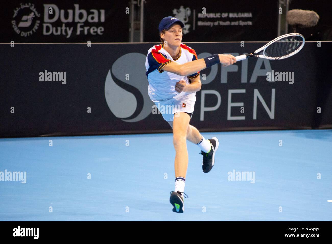 Jannik Sinner of Italy in action during the Sofia Open 2021 ATP 250 final indoor tennis tournament on hard courts Stock Photo