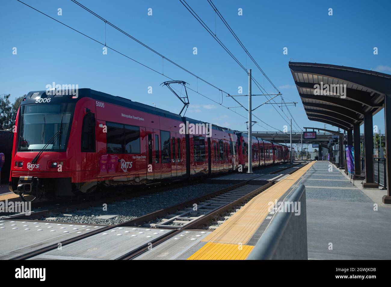 San Diego Trolley stops at the Morena Blvd station during a test run of the UC San Diego Blue Line light rail extension prior to opening. Stock Photo