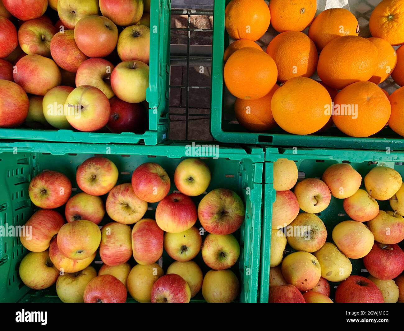 High Angle View Of Apples And Oranges For Sale In Weekly Market Stock Photo
