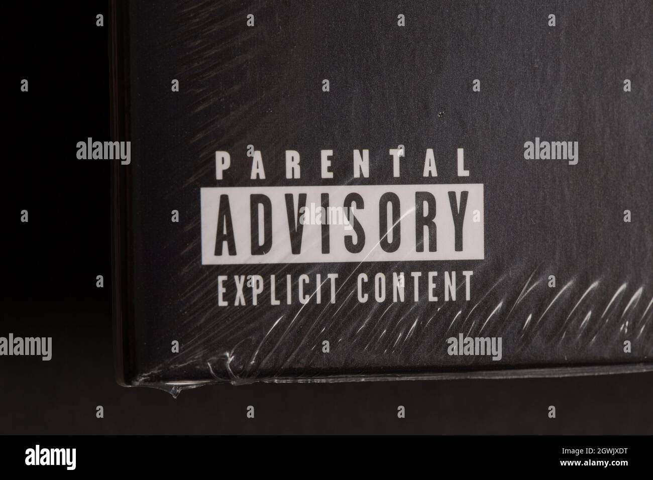 Close up of a parental advisory warning sign on sealed vinyl long playing record. Stock Photo