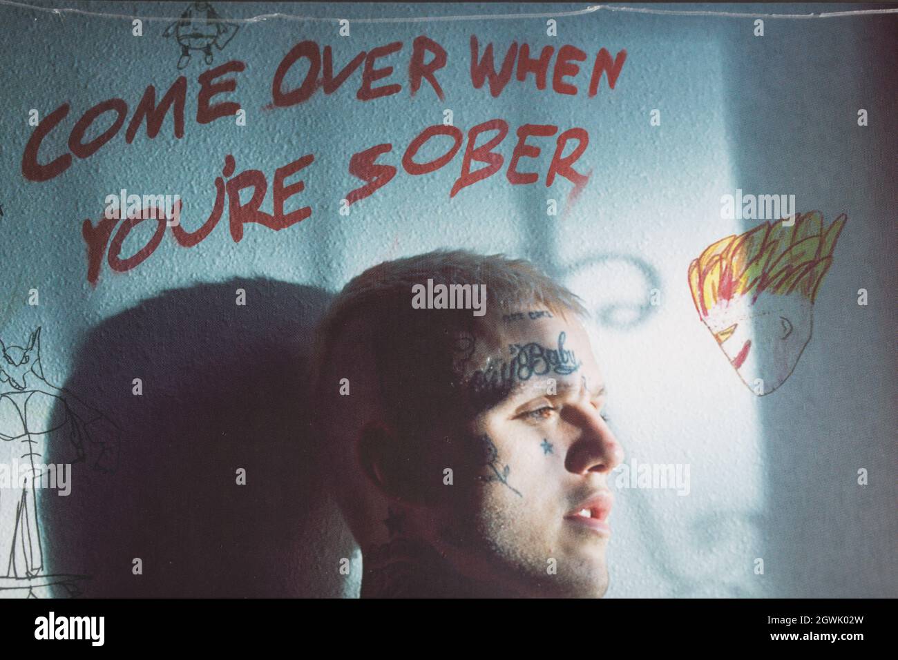 Moscow, Russia - October 3, 2021: Close up of the album cover of american rapper Lil Peep Come over when you're sober. Sealed vinyl record. Stock Photo