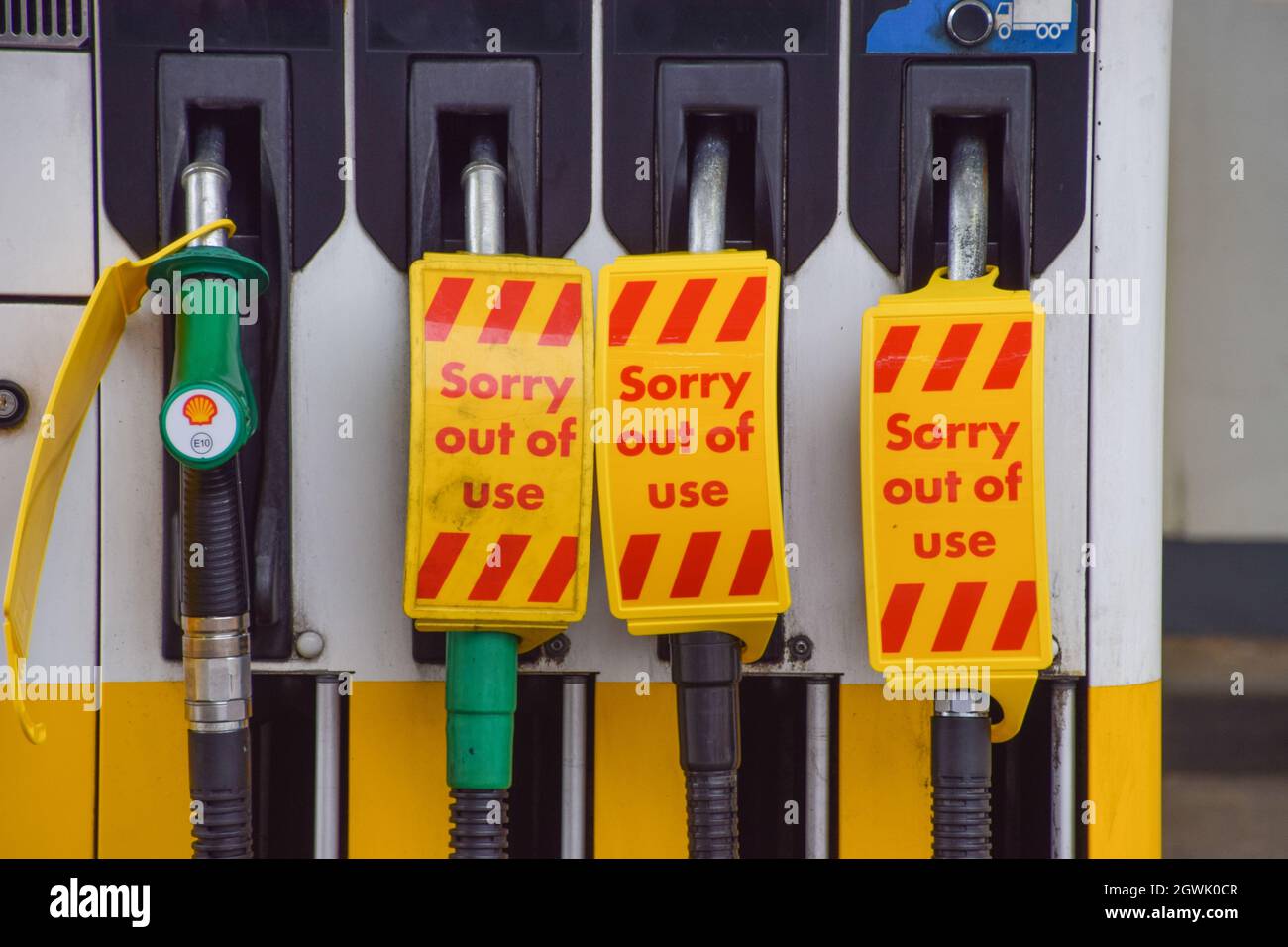 London, UK. 03rd Oct, 2021. 'Sorry, Out Of Use' signs cover the petrol pumps at a Shell station in Islington. Many UK stations have run out of petrol due to a shortage of truck drivers linked to Brexit, along with panic buying. Credit: SOPA Images Limited/Alamy Live News Stock Photo