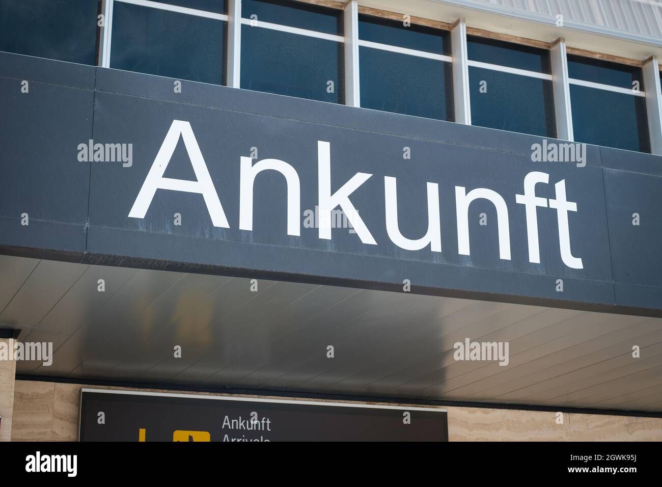 Tenerife, Spain - September, 2021: Arrivals gate sign at Airport (german: Ankunft) gate sign at Airport Stock Photo