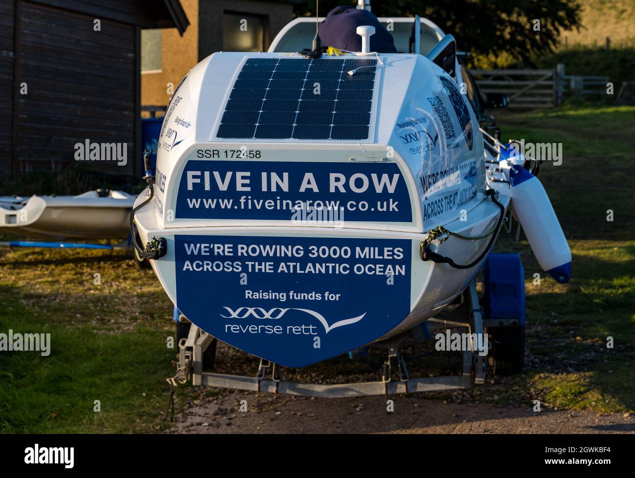 Ocean rowing boat on boat trailer raising funds for Reverse Rett Syndrome in Atlantic challenge, East Lothian, Scotland, UK Stock Photo