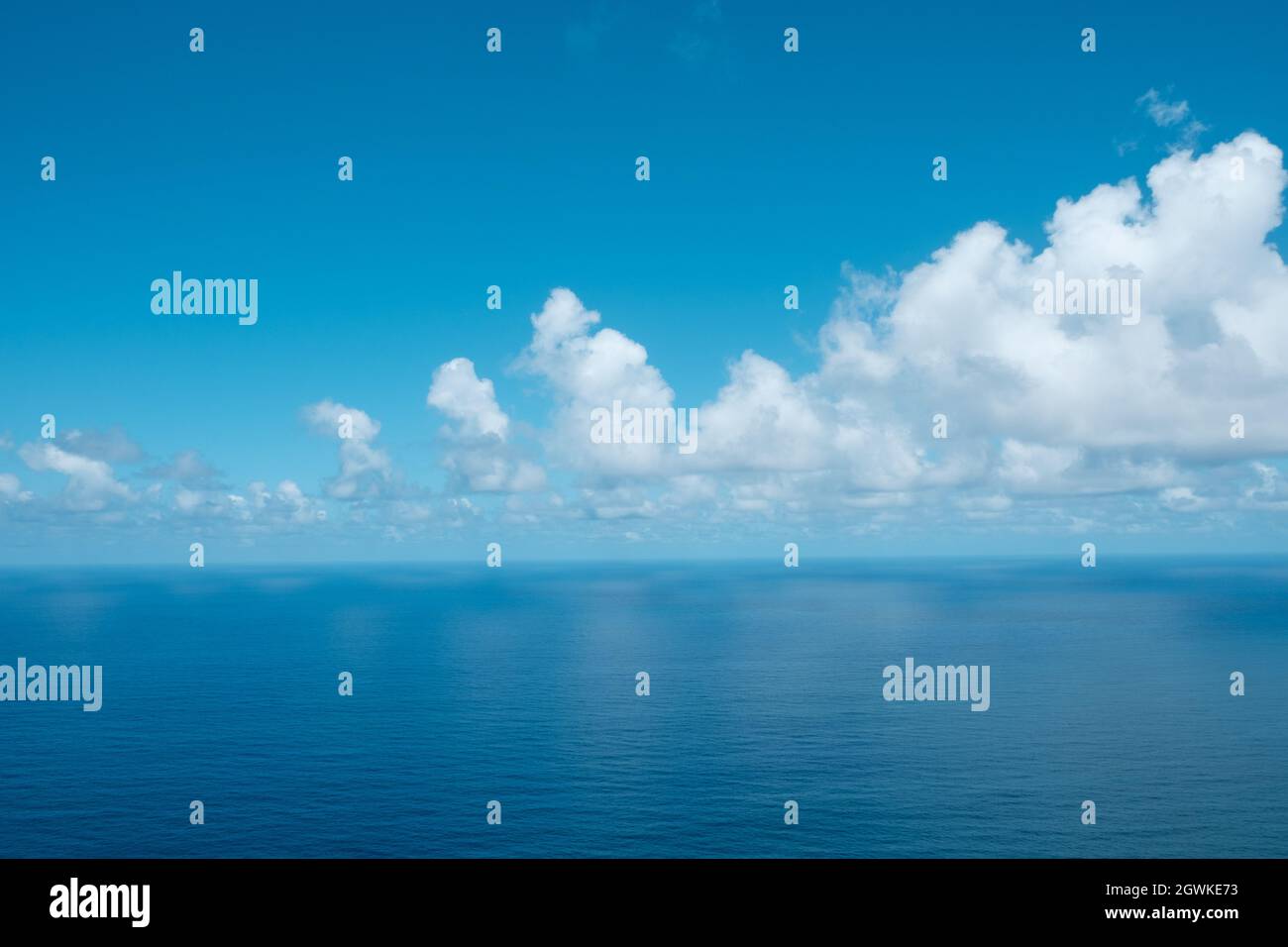 ocean, blue sky and clouds - Stock Photo